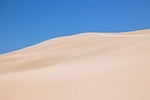 namibia sand dunes desert blue sky namib hiking stock photo