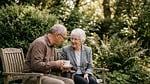 elderly couple garden conversation outdoors companionship retirement peaceful stock photo