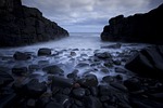 rocks coast sea silhouette seashore rocky coastline cliffs stock photo