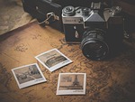 camera photographs souvenir photography photos map trip vacation stock photo