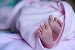baby feet blanket newborn child skin small little stock photo