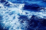 waves sea water blue ocean spume foam nature stock photo