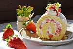 strawberry roll strawberrycake bisquit biscuit cream cakes to stock photo