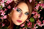 woman beauty flowers face makeup glamour spring beautiful stock photo