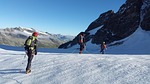 high-altitude mountain tour glacier high tourists rope up stock photo