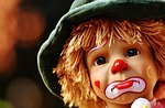 puppet clown sad multicoloured cute funny toy children stock photo