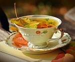 tea nature teacup fall autumnal autumn colors leaves stock photo