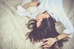 girl sleep lying down dog pet animal owner stock photo