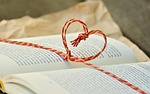 a book gift heart read give training pages stock photo