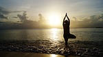 beach yoga sunset silhouette person pose shore seashore stock photo