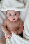 baby blanket newborn towel portrait child innocence cute stock photo