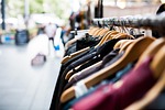 hangers clothing shopping market jacket rack shirt shop stock photo