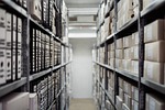 archive boxes shelf folders documents data storage rack stock photo