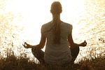 meditate woman nature yoga zen meditating relax relaxing stock photo
