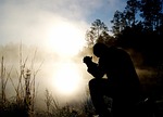 man fog silhouette kneeling kneel pray praying male stock photo