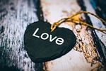 close up heart rustic text wooden love black stock photo