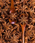 star anise spices spoon seed pod aromatic seasoning stock photo