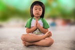 girl child kid pray praying wishing religious wish stock photo
