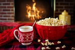 warm and cozy popcorn coffee cup fireplace home stock photo