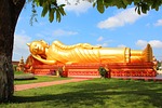 reclining buddha laos temple buddhism landmark stock photo