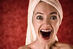 woman towel surprised excited excitement portrait makeup girl stock photo
