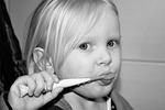 brush teeth child dental office care cleaning hygiene stock photo