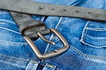 blue jeans belt buckle metal leather denim pants stock photo
