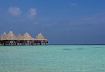 maldives ari atoll sea bungalow paradise nature beach stock photo