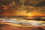 sunset north sea evening atmosphere beach coast clouds stock photo