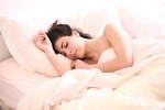 woman asleep girl sleep bed cozy tired rest stock photo