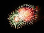 fireworks night sky pyrotechnics new year festival display stock photo
