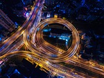 streets night lights circle highways top view cityscape stock photo