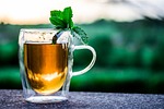 teacup cup of tea peppermint drink hot leaves stock photo
