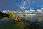 lagoon boat morning the water shed atoll widi stock photo