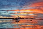 lagoon boat sunset nature the water shed atoll stock photo