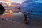evening lagoon boat the water shed atoll widi stock photo