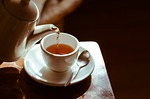 tea hot cup table tea-time nature break herbal stock photo