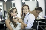 bride make-up artist stock photo