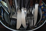 cutlery knife forks metal washing dishes stock photo