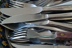 cutlery knife forks metal washing dishes stock photo