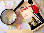 travel london map magnifying glass planning holiday stock photo