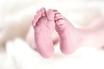 baby feet toes sole small newborn child stock photo