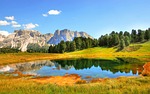 dolomites val gardena lake mountains nature scenery reflection stock photo