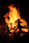 wood campfire stick bread summer friends heat nature stock photo