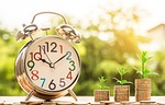 clock money growth grow time management financial concept stock photo