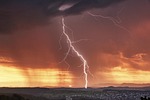 lightning red nature coloured light heaven thunderstorm rain stock photo