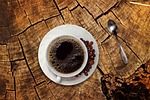 coffee cup drink beans wooden table still life stock photo