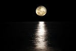 moon full sea sky night lunar moonlight scenery stock photo