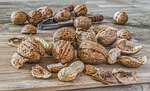 nuts walnuts nutcracker brown eat food shells close stock photo