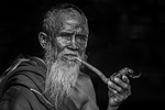 portrait smoking old people man pipe beard elderly stock photo
